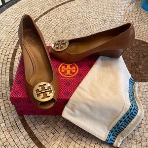 Tory Burch tan leather wedges.